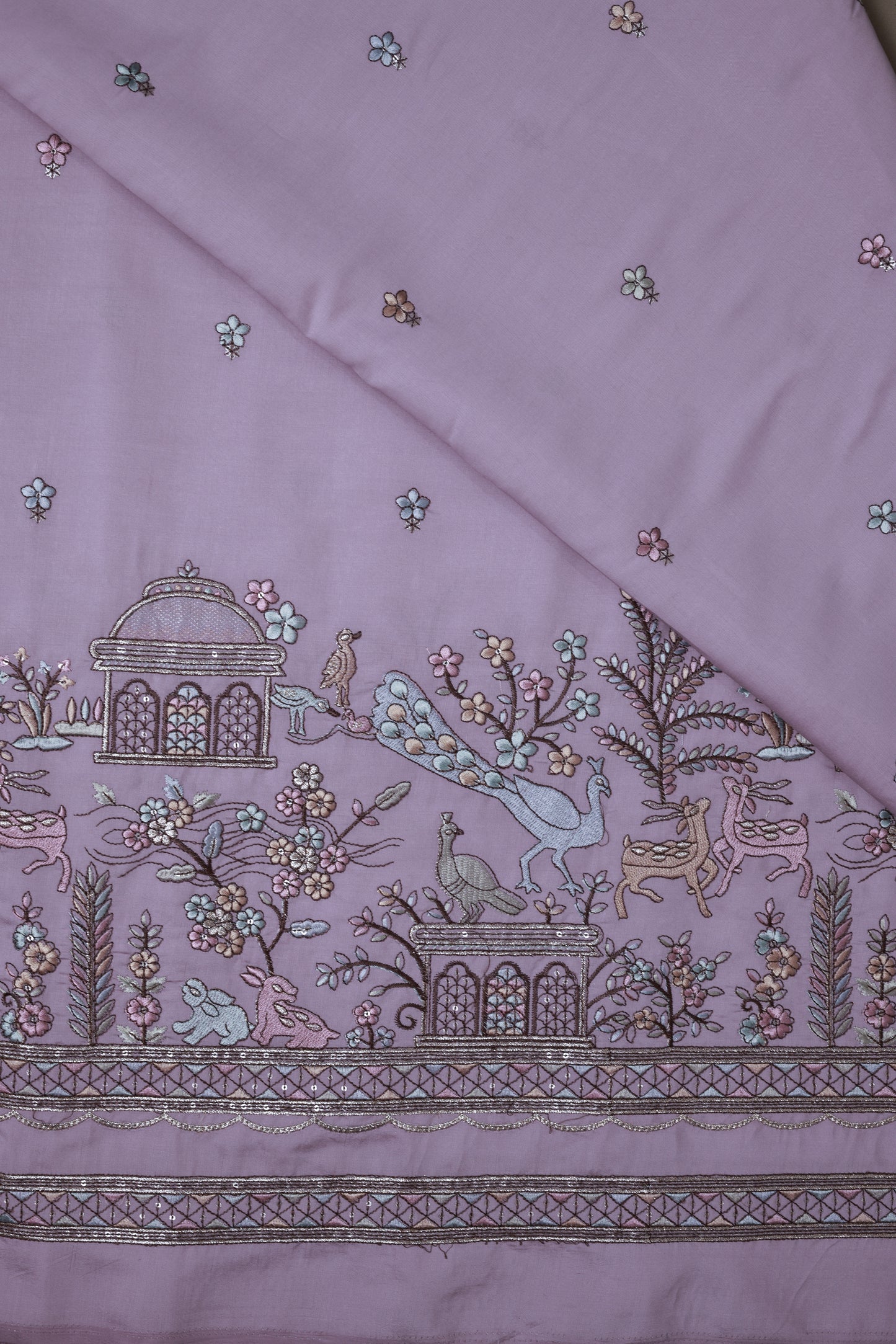 Embroidered Fabric with Floral and Animal Motif Detailing