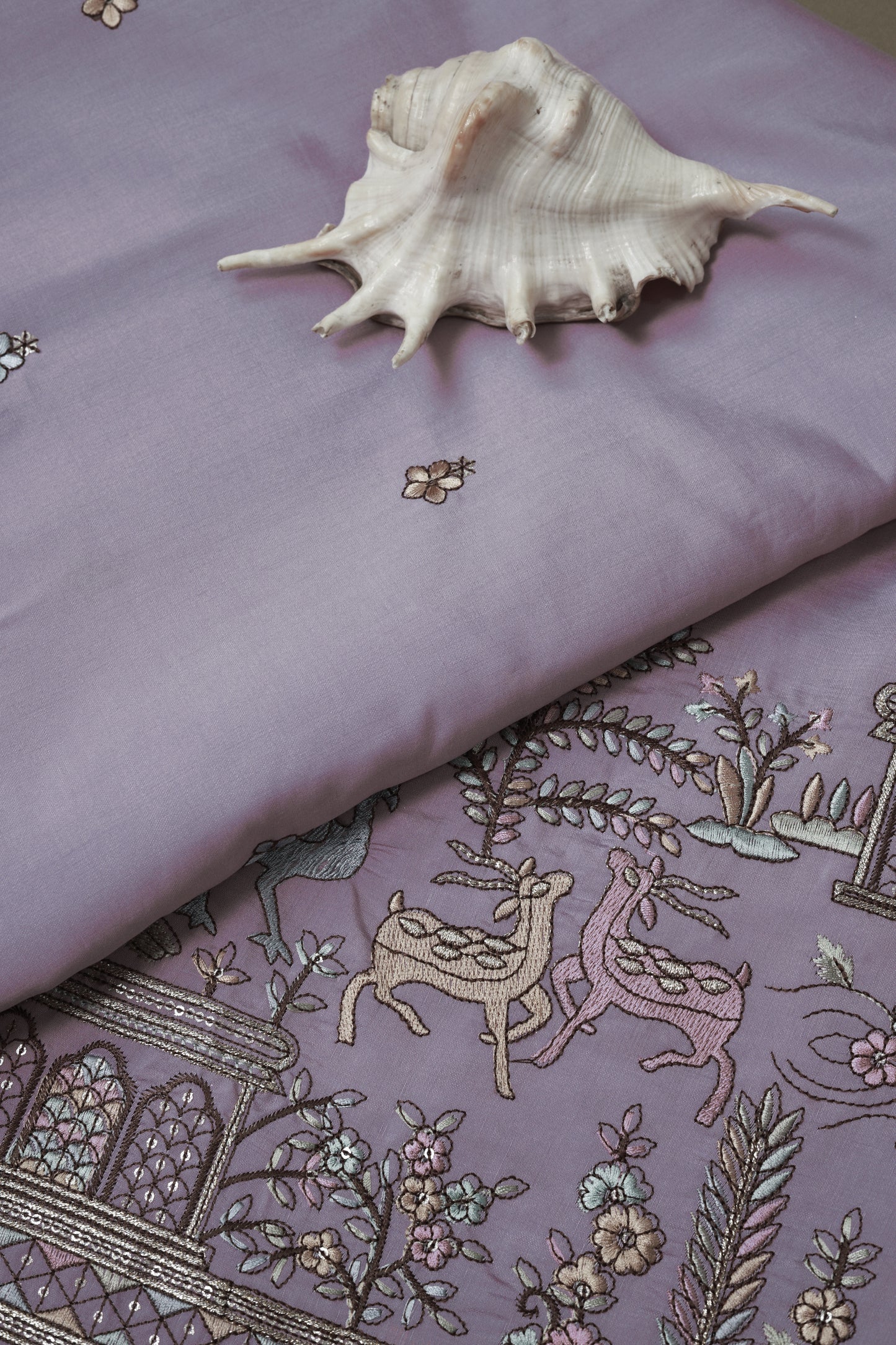 Embroidered Fabric with Floral and Animal Motif Detailing