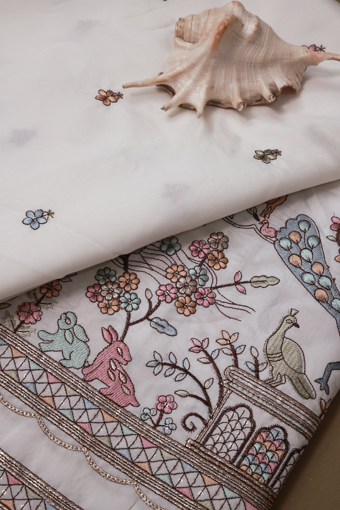 Embroidered Fabric with Floral and Animal Motif Detailing