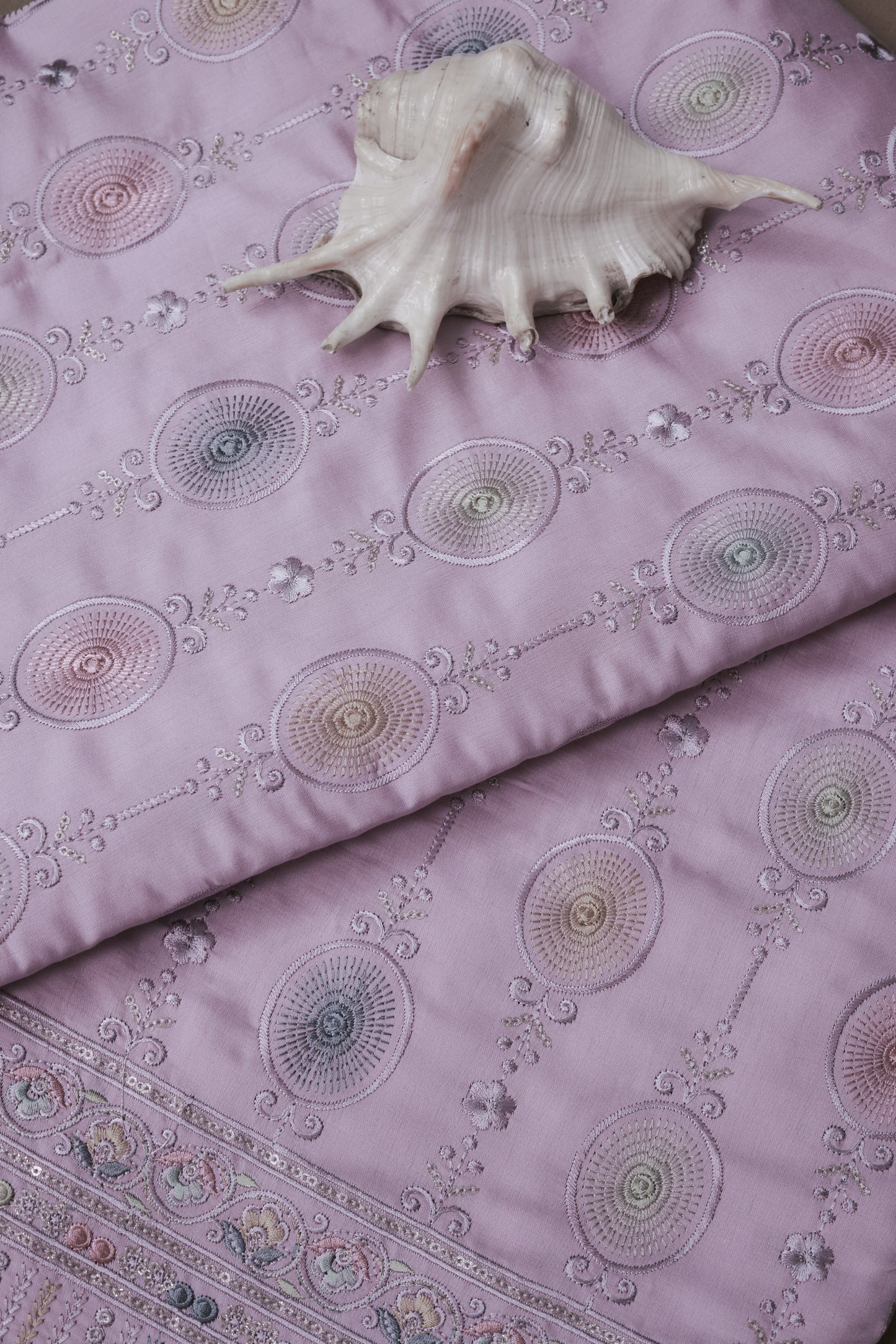Embroidered Fabric with Circular and Floral Motifs