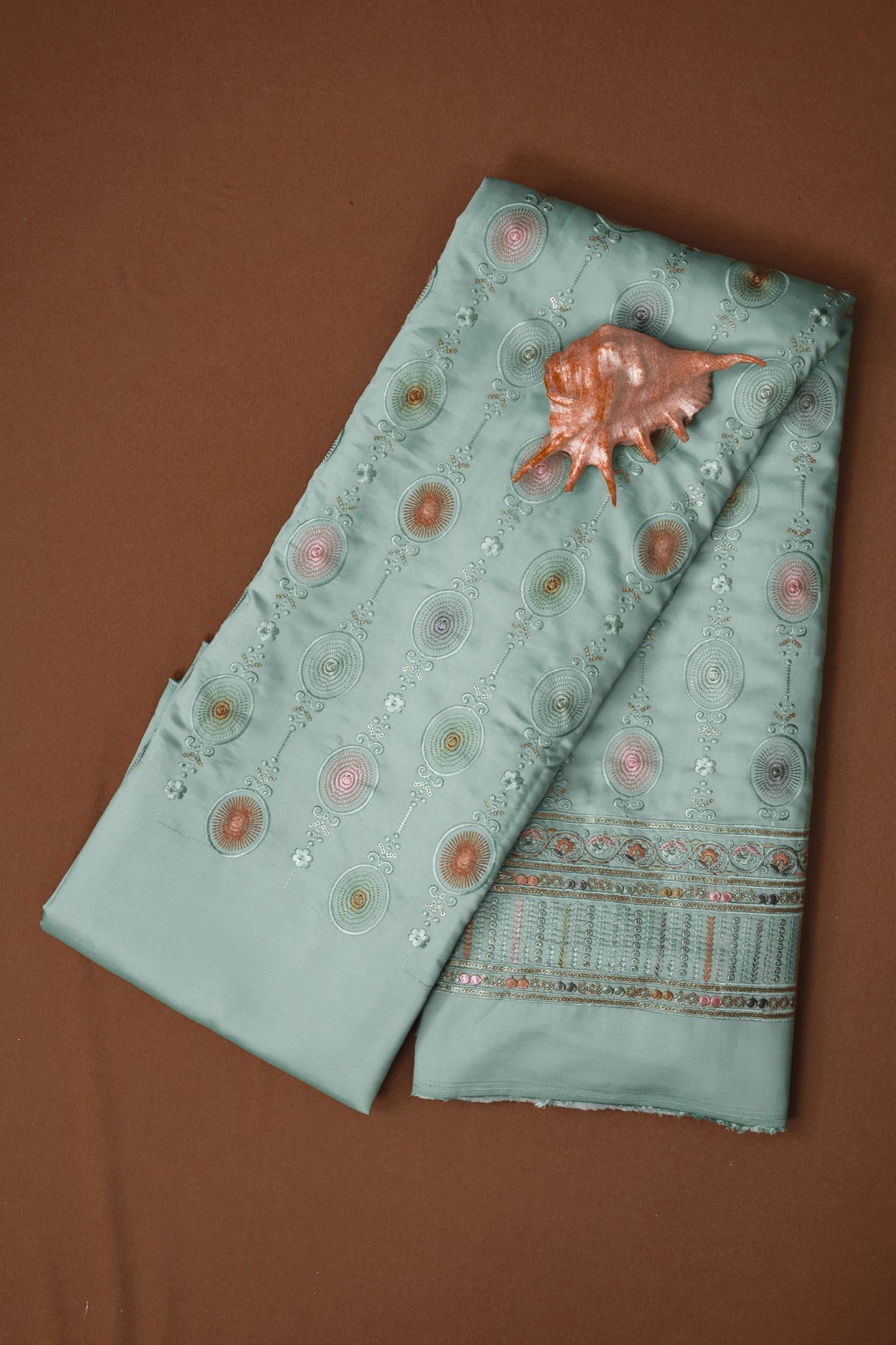 Embroidered Fabric with Circular and Floral Motifs