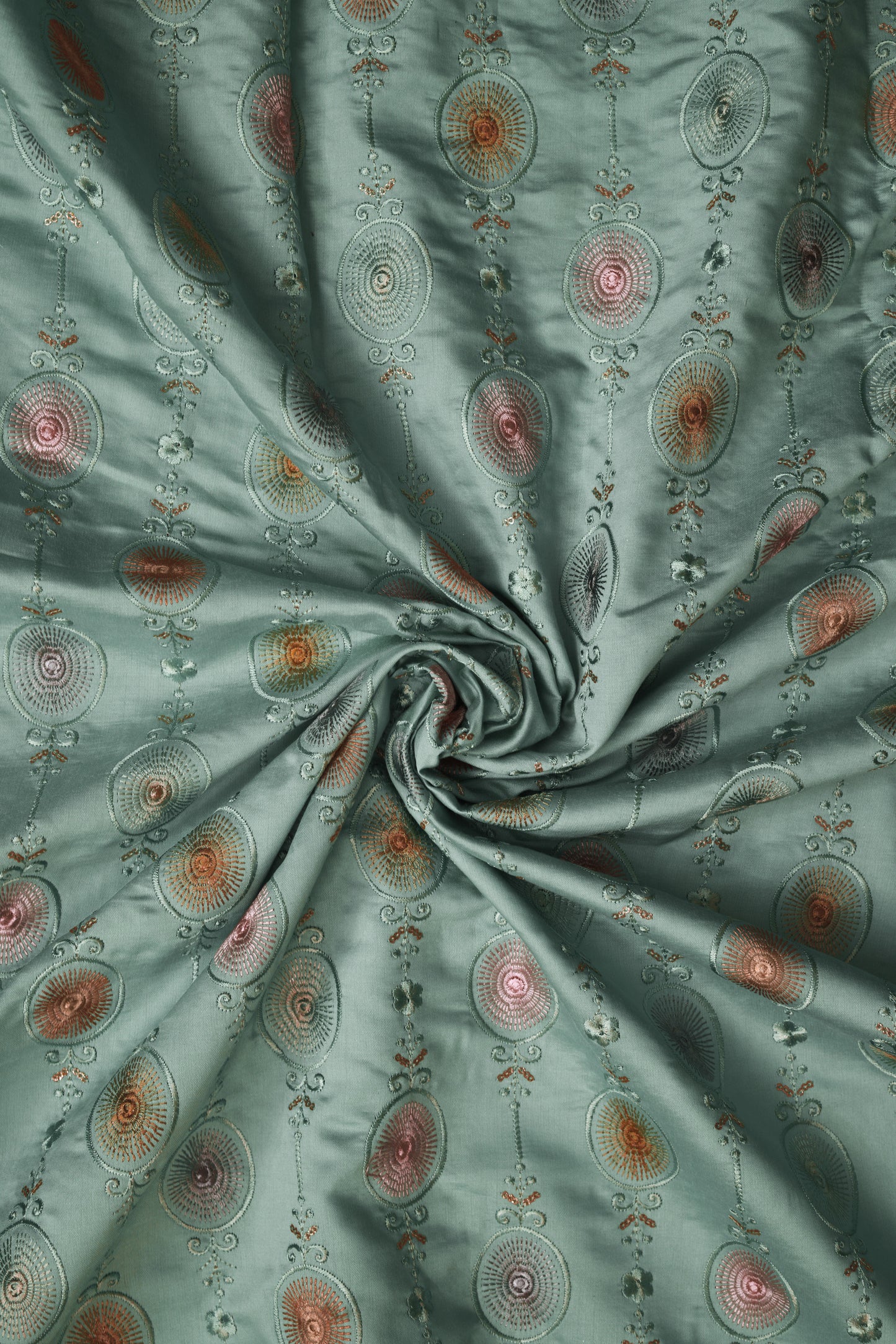 Embroidered Fabric with Circular and Floral Motifs