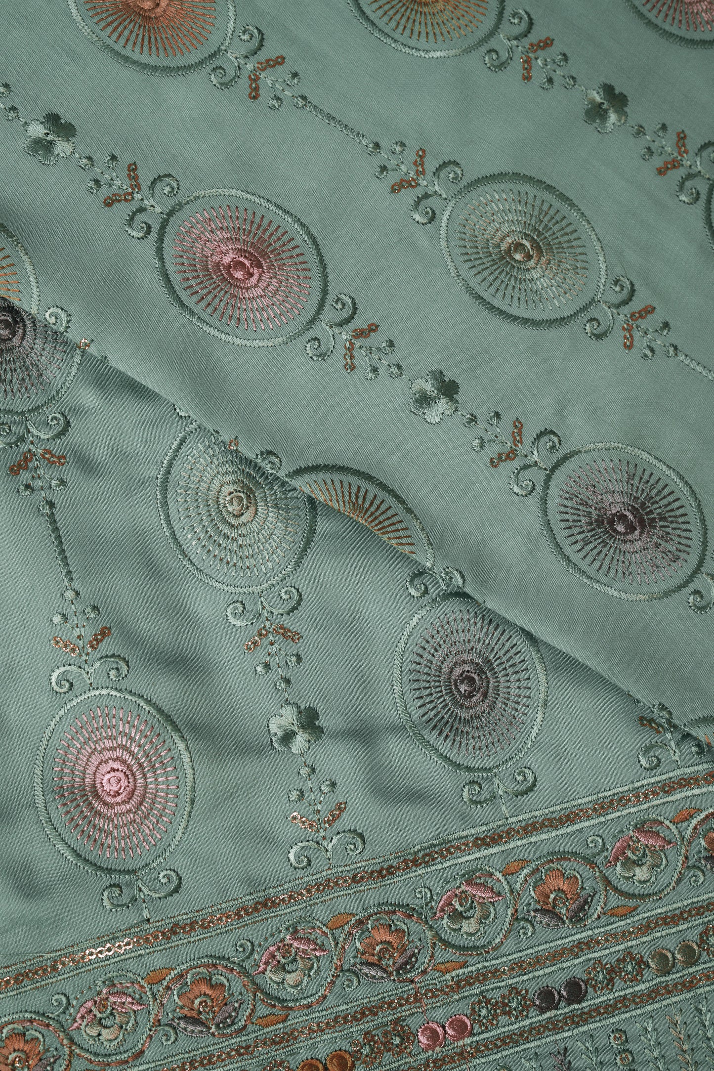 Embroidered Fabric with Circular and Floral Motifs