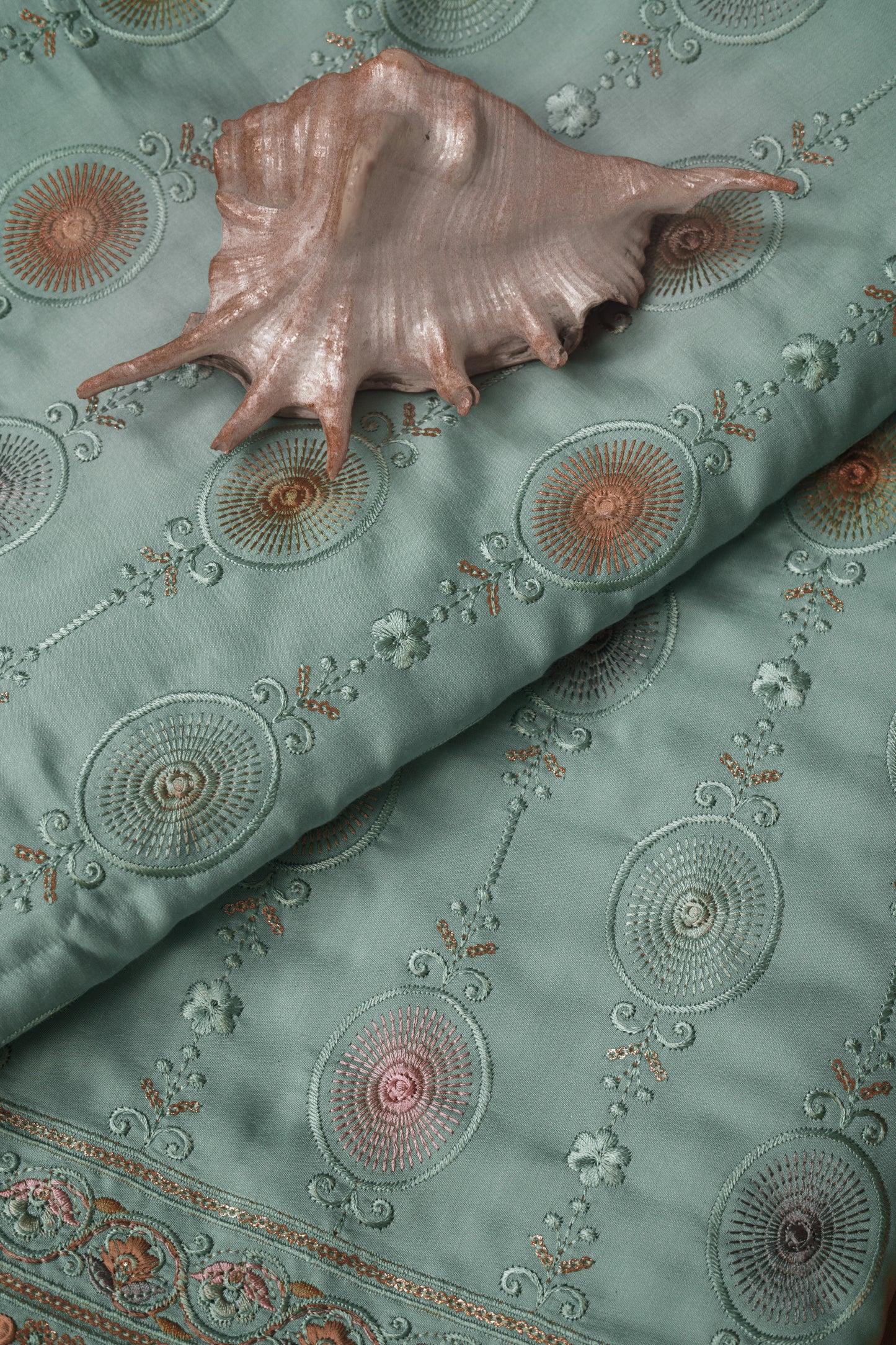 Embroidered Fabric with Circular and Floral Motifs