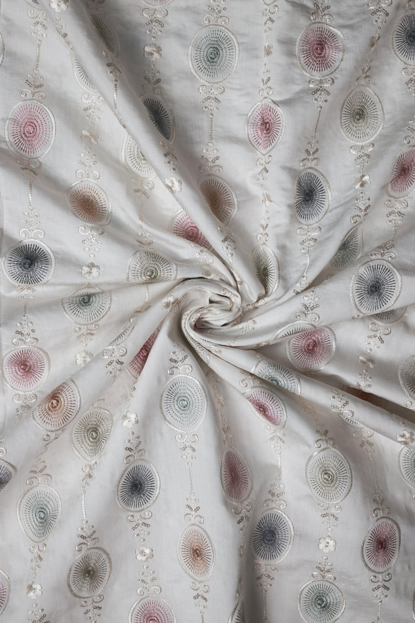 Embroidered Fabric with Circular and Floral Motifs