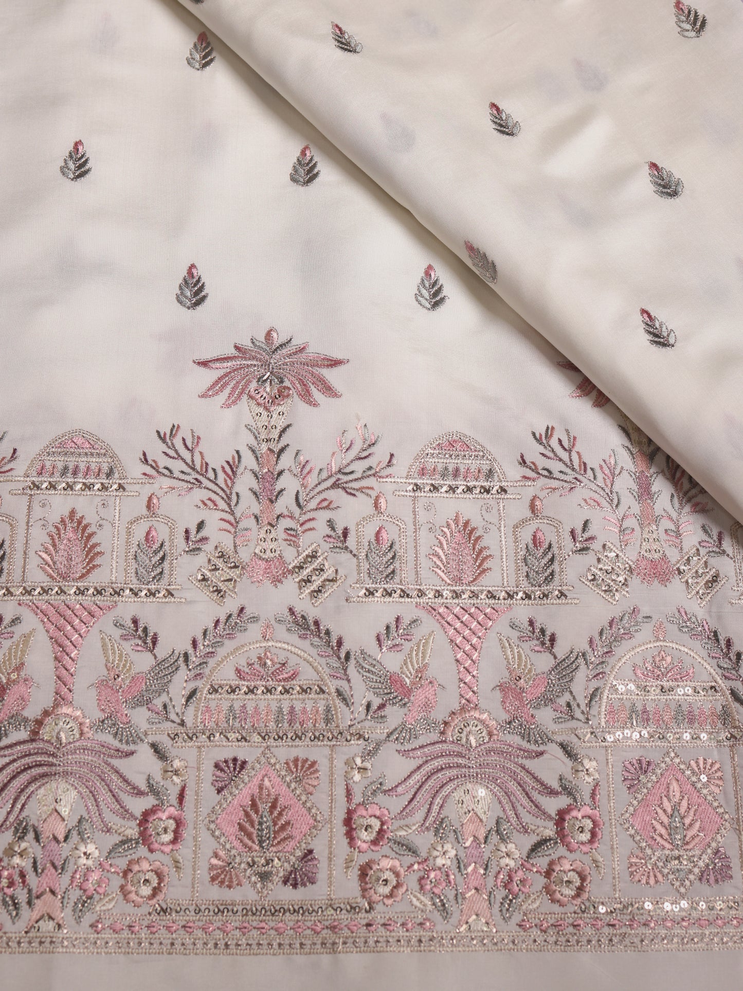 Mughal-inspired motifs with floral patterns in Viscose Fabric