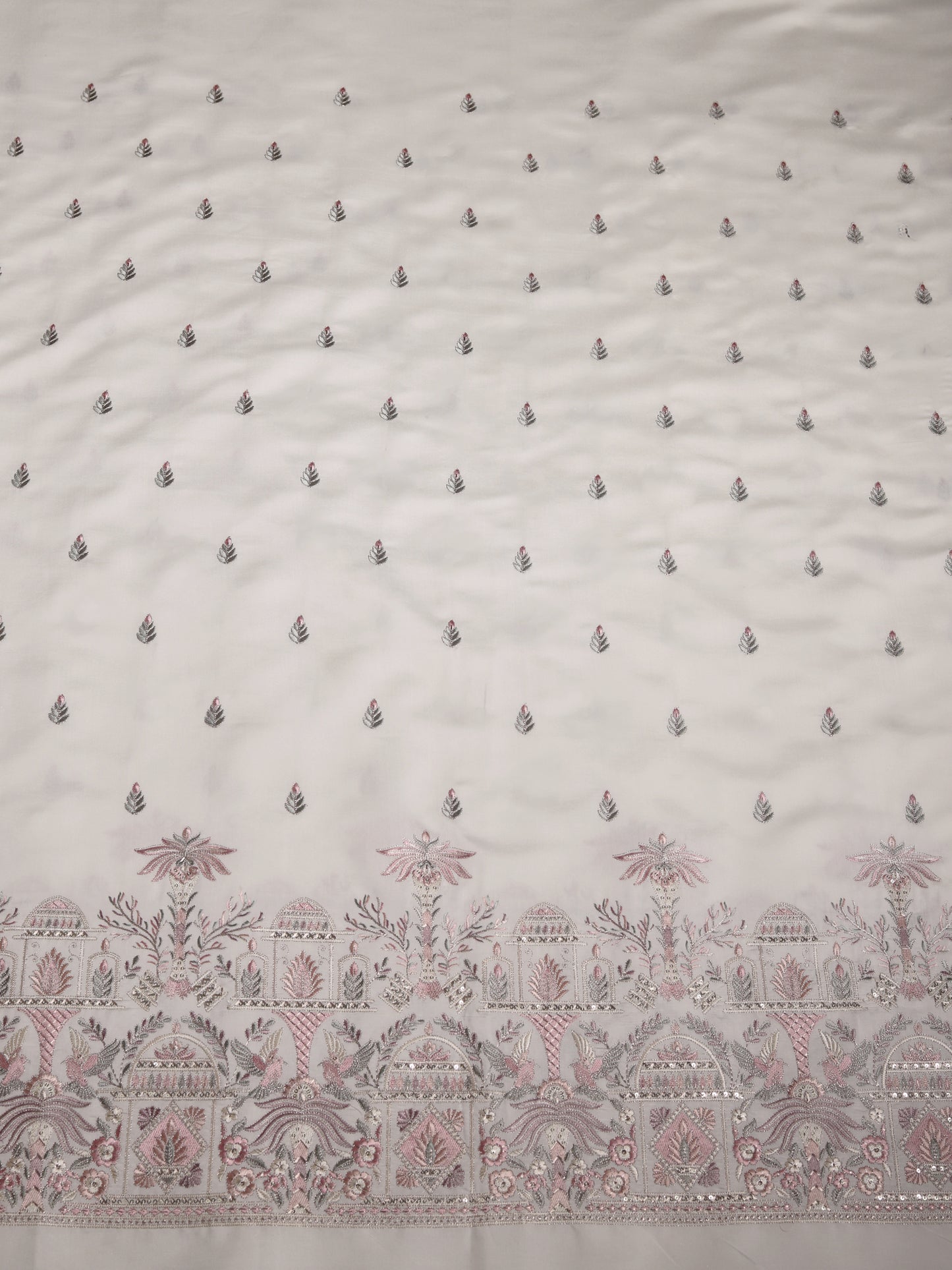 Mughal-inspired motifs with floral patterns in Viscose Fabric