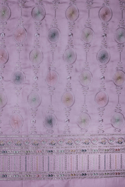 Embroidered Fabric with Circular and Floral Motifs