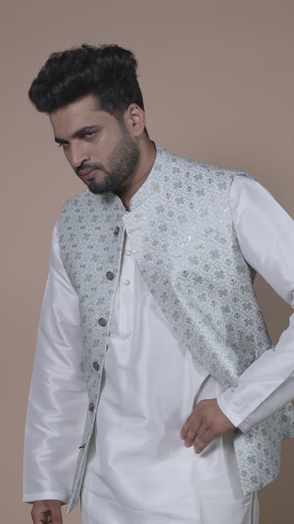 Elegant Light Teal Embroidered Fabric with Floral Medallion Motifs